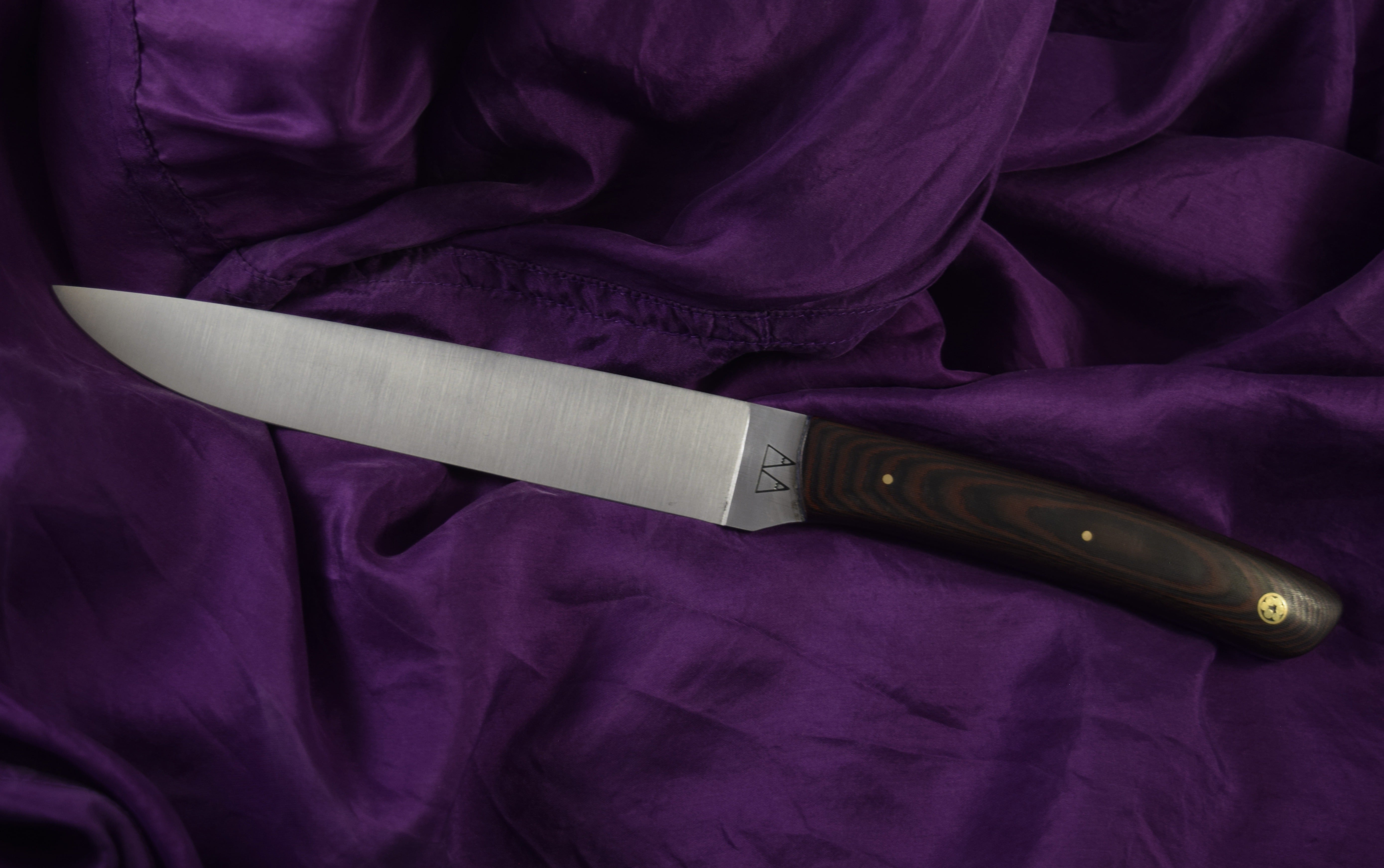 A Kudu with a Micarta handle.